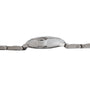 Side view of the Cartier Ballon Bleu, featuring a silver metal link band and a round, raised watch case.