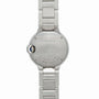 The back of a Cartier Ballon Bleu watch features engraved text and a stainless steel link bracelet.