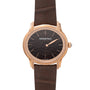 The Audemars Piguet Millenary Philosophique features a textured dial and gold case, paired with a brown leather strap.