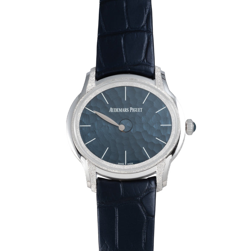 Audemars Piguet Millenary Philosophique: a silver wristwatch featuring a blue textured dial and a dark blue leather strap.