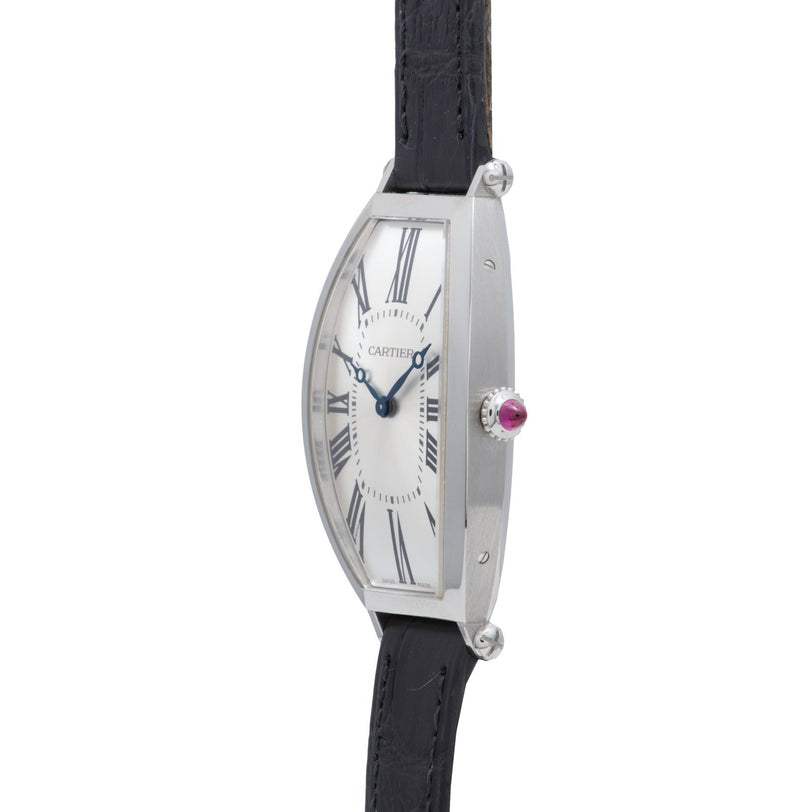 Side view of the Cartier Tonneau Platinum wristwatch featuring a white face, Roman numerals, and a black leather strap.