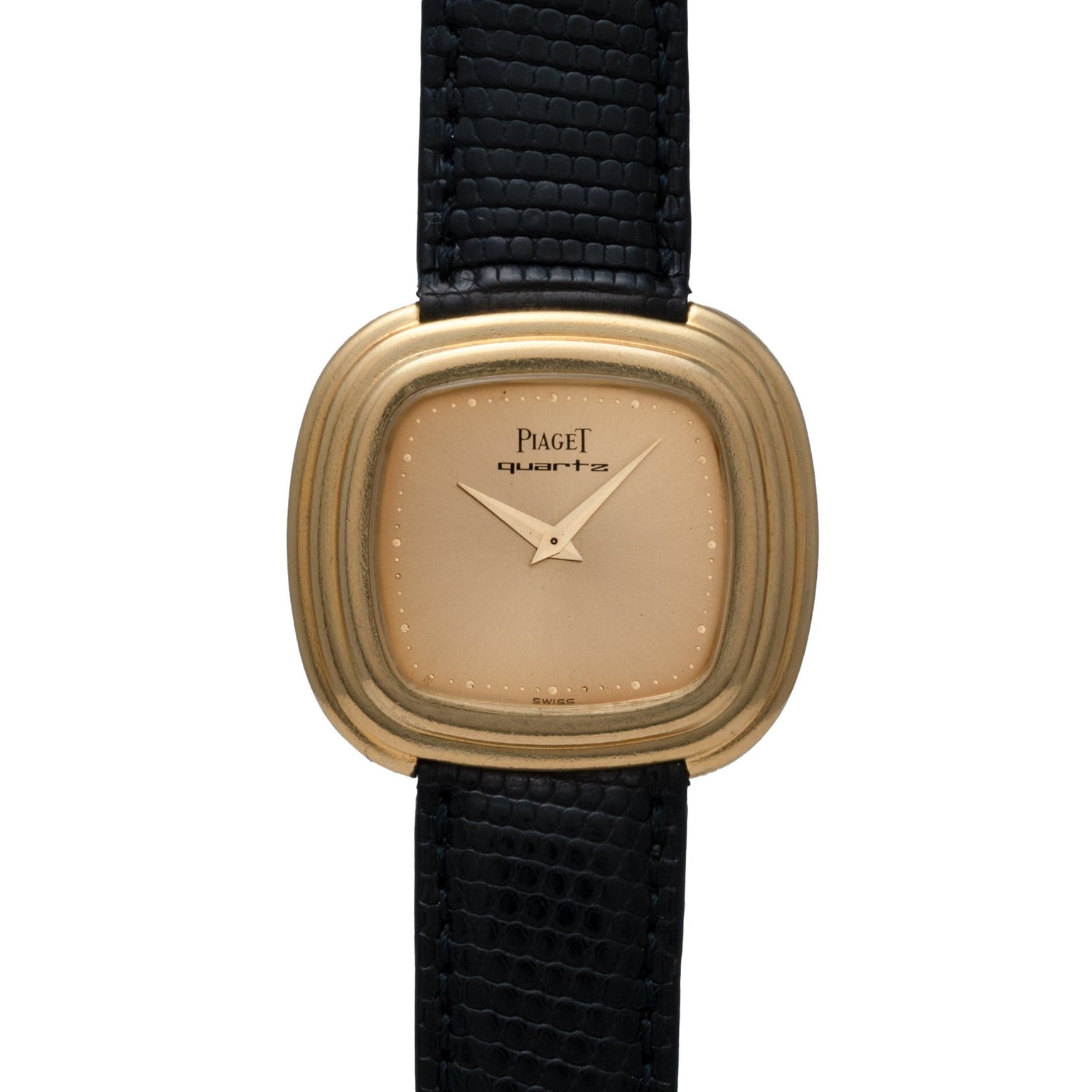 The Piaget Emperador Mini Warhol is a gold quartz watch featuring a square face, black leather strap, and a minimalistic design.