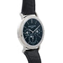 A Patek Philippe Perpetual Calendar Moonphase wristwatch in black with a silver case and multiple dials.