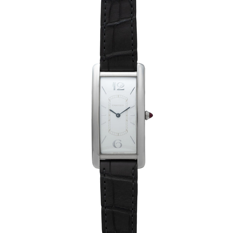 The Cartier Tank Cintrée Limited Edition is a rectangular silver watch featuring a white face, black leather strap, and simple black hands.
