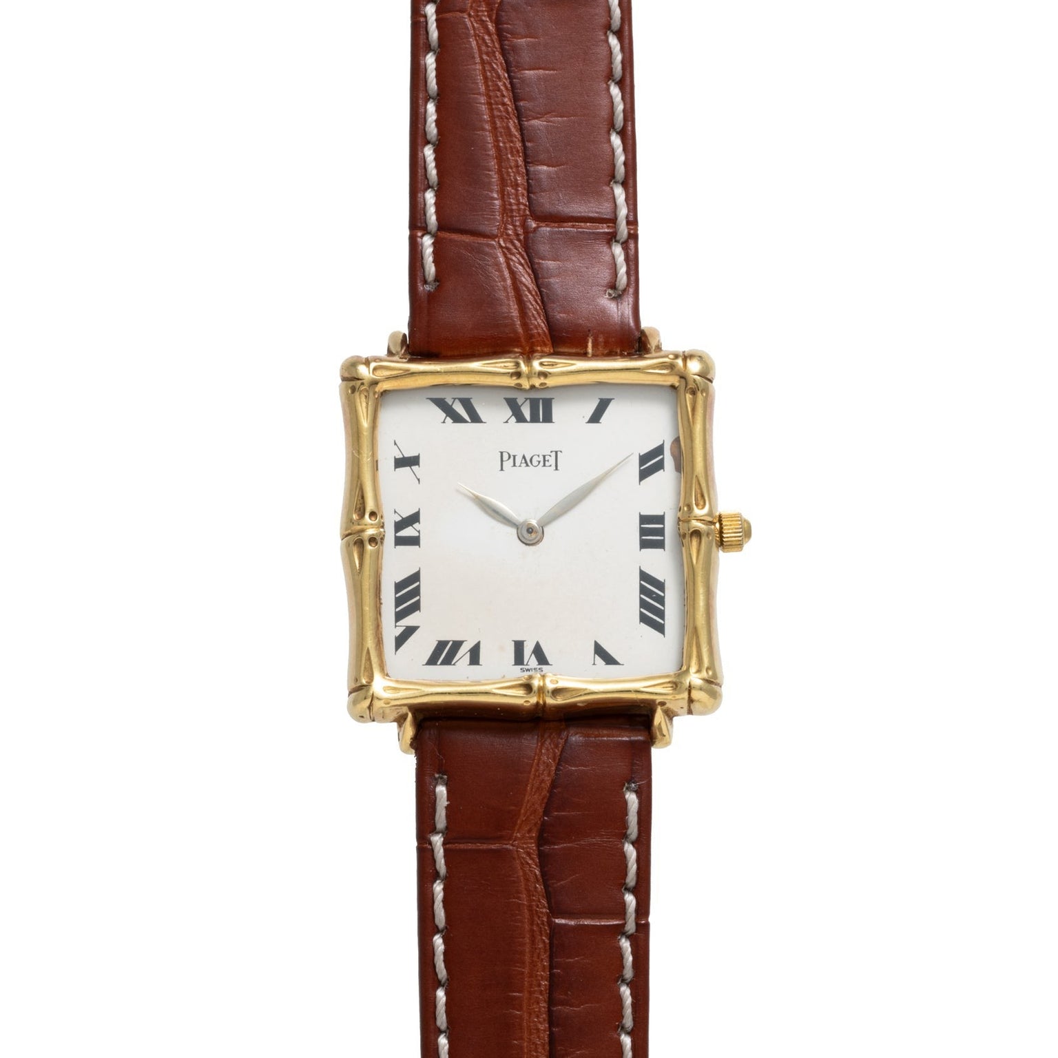 Bamboo Dress Watch by Piaget: gold square case, Roman numerals, and brown leather strap shown on a white background.