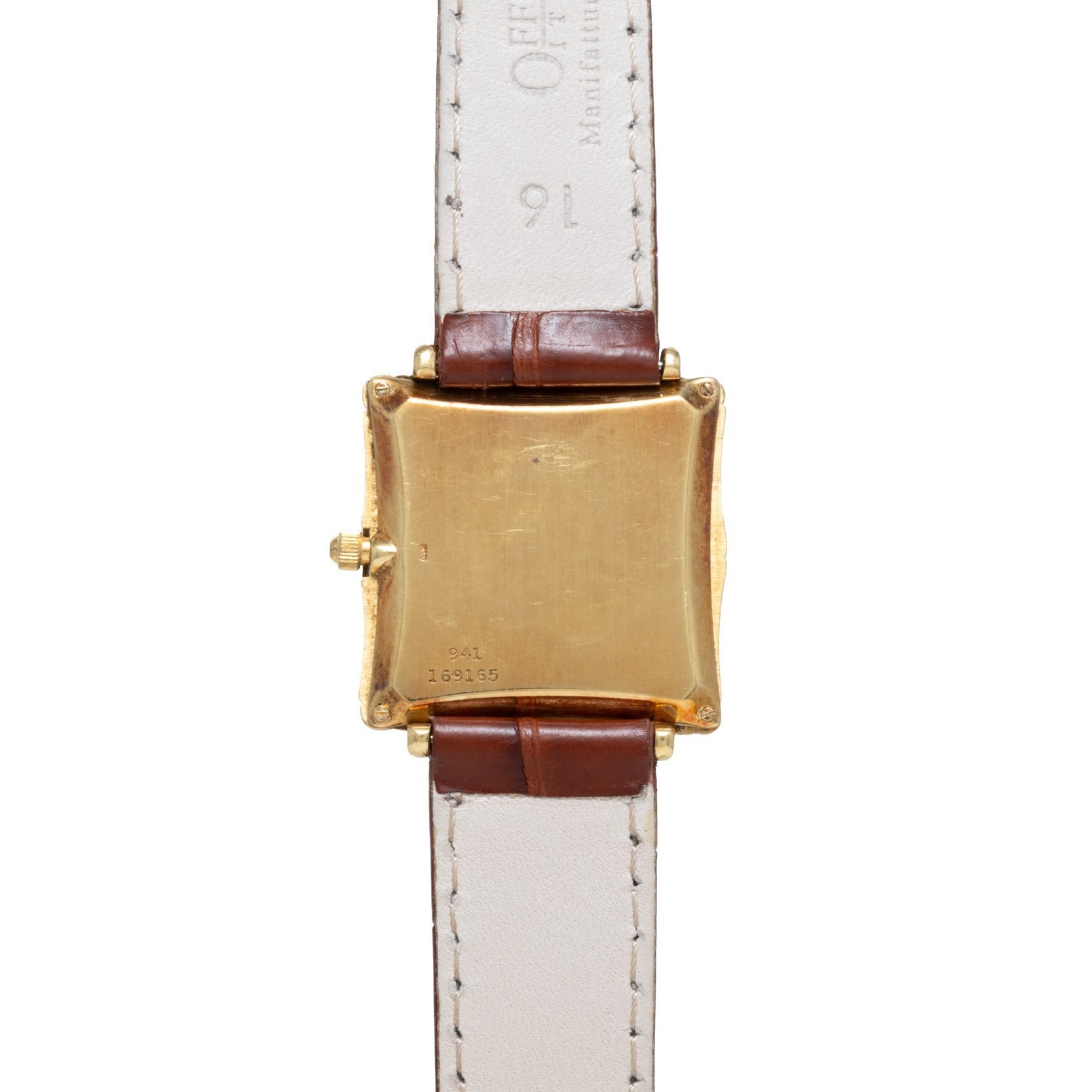 Back view of the Piaget Bamboo Dress Watch featuring a square gold case, brown leather straps, and cream-colored lining.