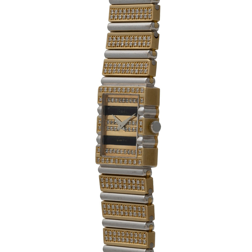 Piaget Polo Pave: Gold and silver watch with a rectangular face, diamond accents on the band, and sparkling pavé around the dial.
