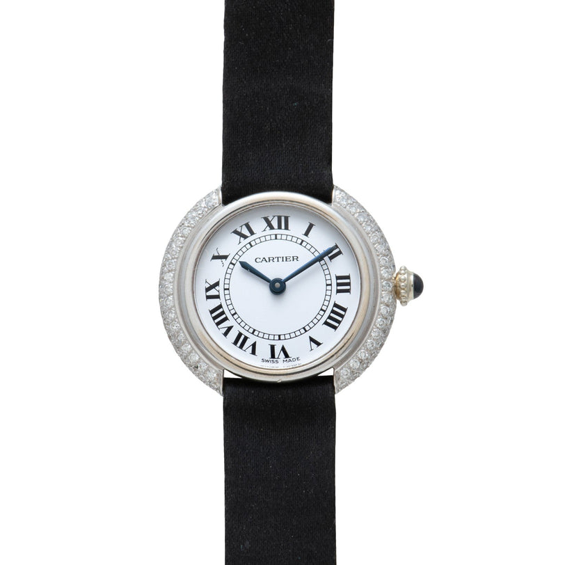 The Cartier Vendome Diamond watch features a black strap, Roman numerals, and a diamond-encrusted bezel.