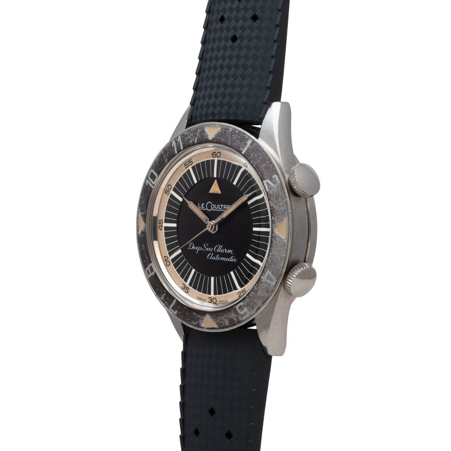 A vintage Jaeger-LeCoultre Deep Sea Alarm U.S. Edition dive watch featuring a black strap, dual crowns, and a worn rotating bezel.