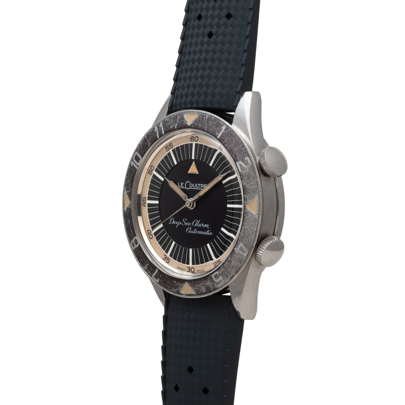 A vintage Jaeger-LeCoultre Deep Sea Alarm U.S. Edition dive watch featuring a black strap, dual crowns, and a worn rotating bezel.