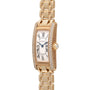 The Cartier Tank Americaine Diamond wristwatch features Roman numerals and diamond accents on its rectangular case and bracelet.