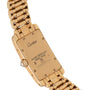 Back of a Cartier Tank Americaine Diamond watch with engraved details and a linked bracelet.