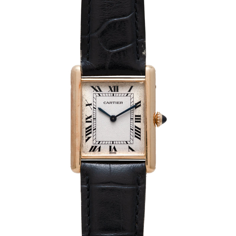 The Cartier Tank Louis Mechaniqúe features a rectangular face, black Roman numerals, and a black leather strap.