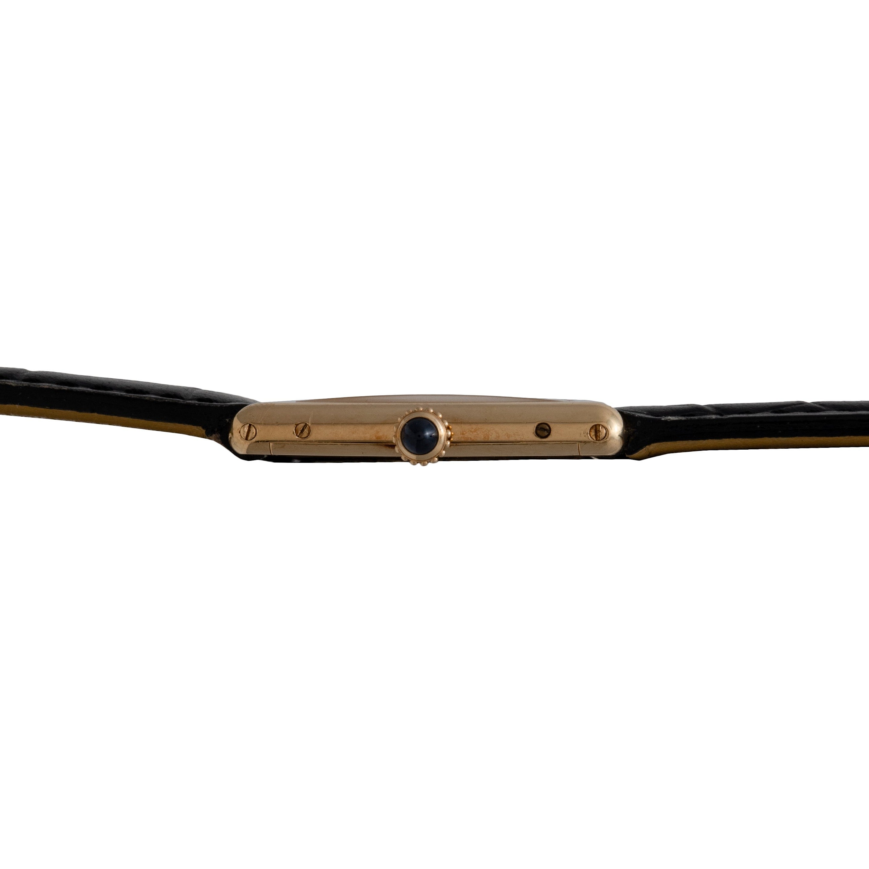 Side view of the Cartier Tank Louis Mechaniqúe, a slim gold wristwatch featuring a black leather strap and a round, dark crown.