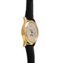 Patek Philippe Retrograde Perpetual Calendar wristwatch with white dial, Roman numerals, black leather strap, and moon phase display shown at an angle.
