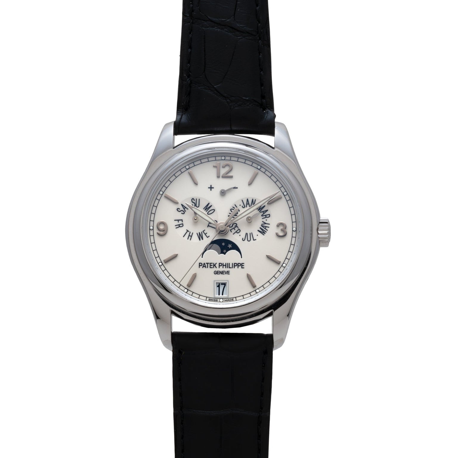 The Patek Philippe Annual Calendar Moonphase features a white dial with moon phase and calendar displays, complemented by a black leather strap.