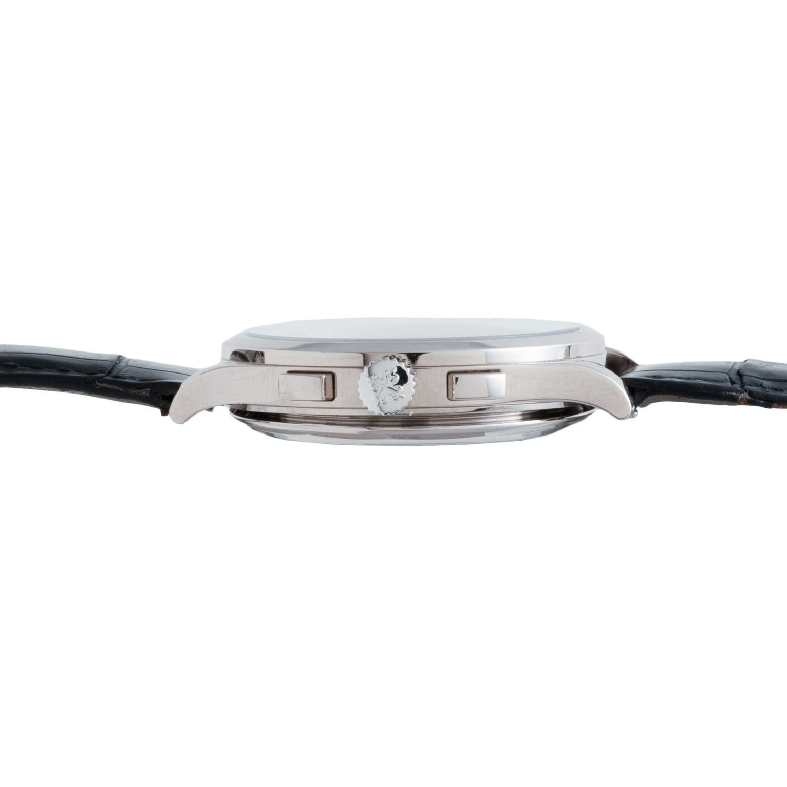 Side view of the Patek Philippe Chronograph featuring a black leather strap, silver case, and crown.