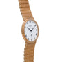 The Patek Philippe Calatrava features a gold case, white dial with Roman numerals, and a textured gold band.