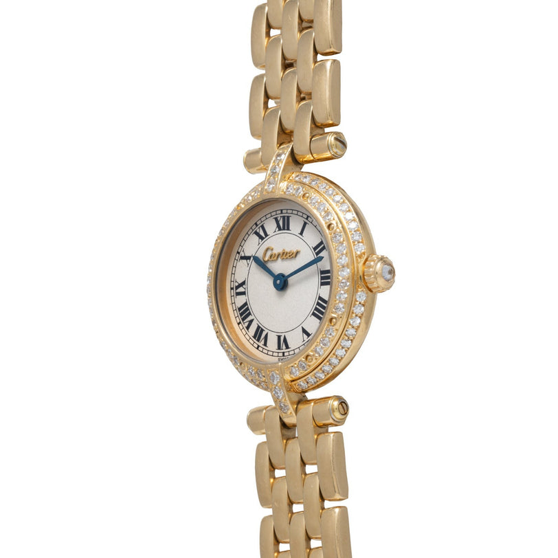 Panthere Ronde by Cartier watch with diamond bezel, Roman numeral dial, and linked bracelet angled to the right.