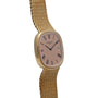 The Patek Philippe Ellipse Jumbo features a gold mesh strap, pink dial, Roman numerals, and a date window on the right.