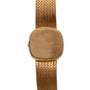 The Patek Philippe Ellipse Jumbo is a gold wristwatch with a blank, square face and a woven metal band, shown from above.