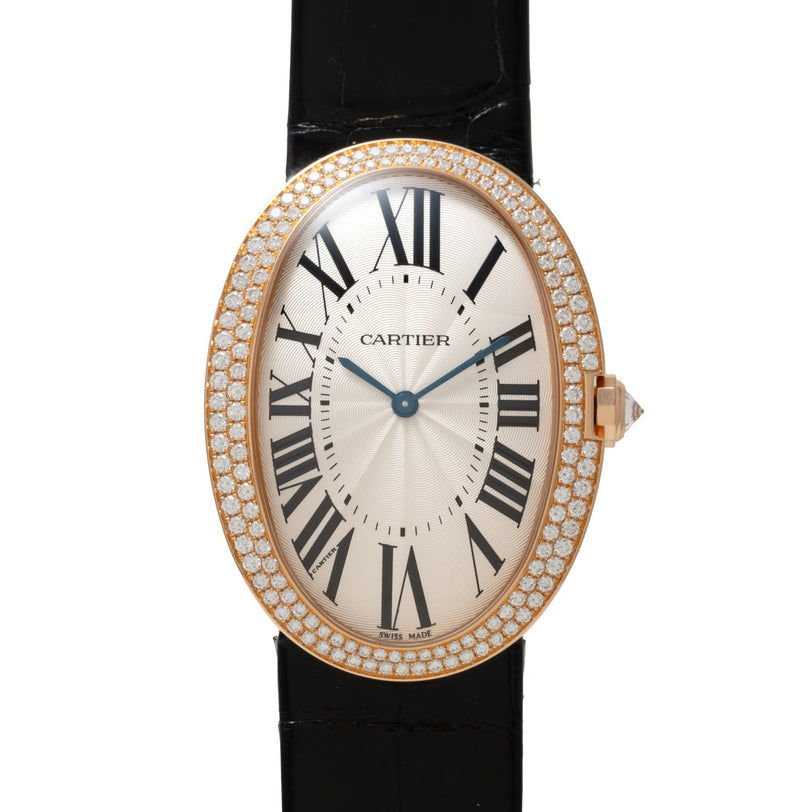Cartier Baignoire Jumbo: an oval watch with a diamond bezel, Roman numerals, and a black leather strap.
