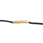 Side view of the Cartier Protocole gold wristwatch with a blue strap, highlighting the crown and slim case.