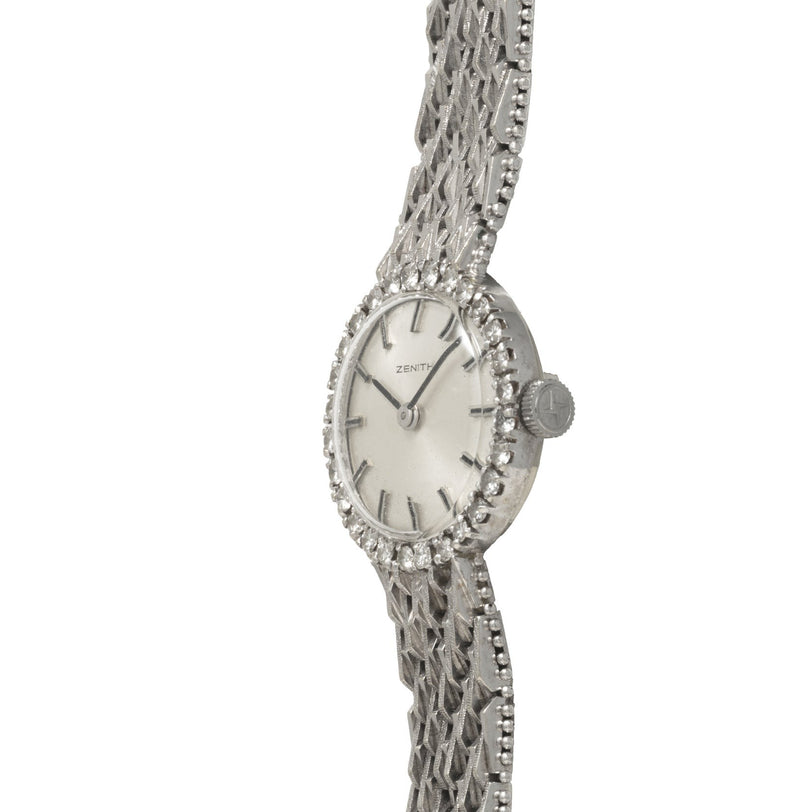 The Zenith Ladies Cocktail Watch features a textured metal band and a round bezel adorned with diamonds.