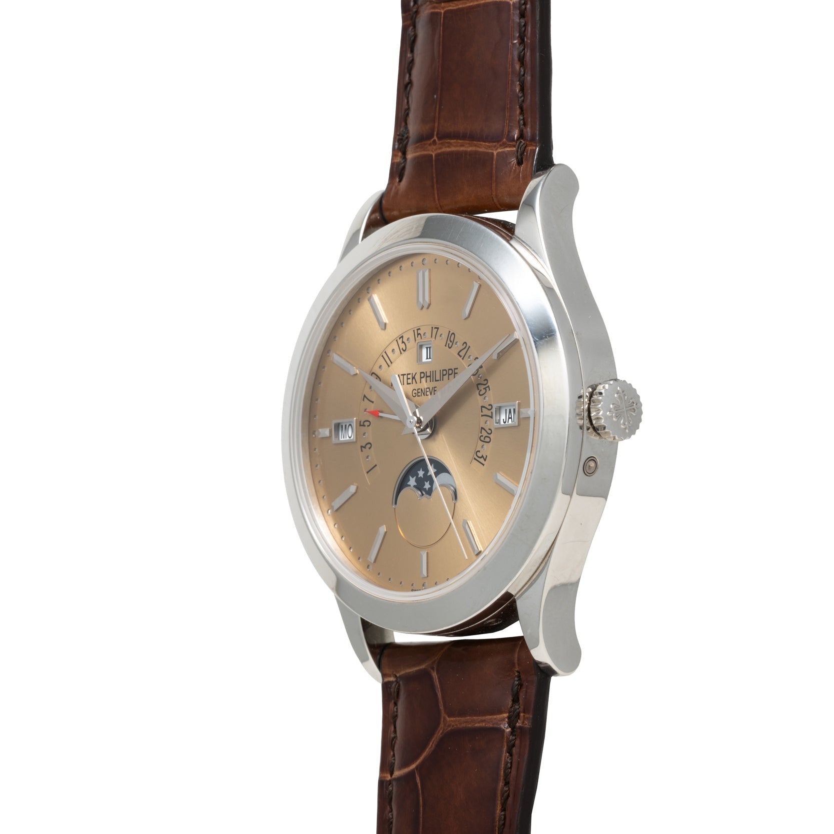 Side view of the Patek Philippe Retrograde Perpetual Calendar luxury watch featuring a brown leather strap and beige dial with date and moon phase display.
