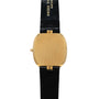 The Patek Philippe Ellipse gold watch features a black leather strap and is shown from the back, with no visible markings or logo.