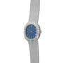 The Patek Philippe Ellipse Ladies Dress Watch features a blue face, diamond bezel, and textured metal strap, shown against a white background.