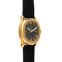 The Patek Philippe Aquanaut features a black face with numbered dial, date window, and a textured black rubber strap.