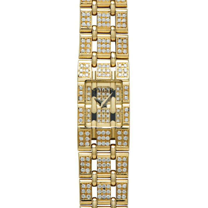 Piaget Polo Pave gold wristwatch with a rectangular face, diamond accents on the band and dial, shown from above.