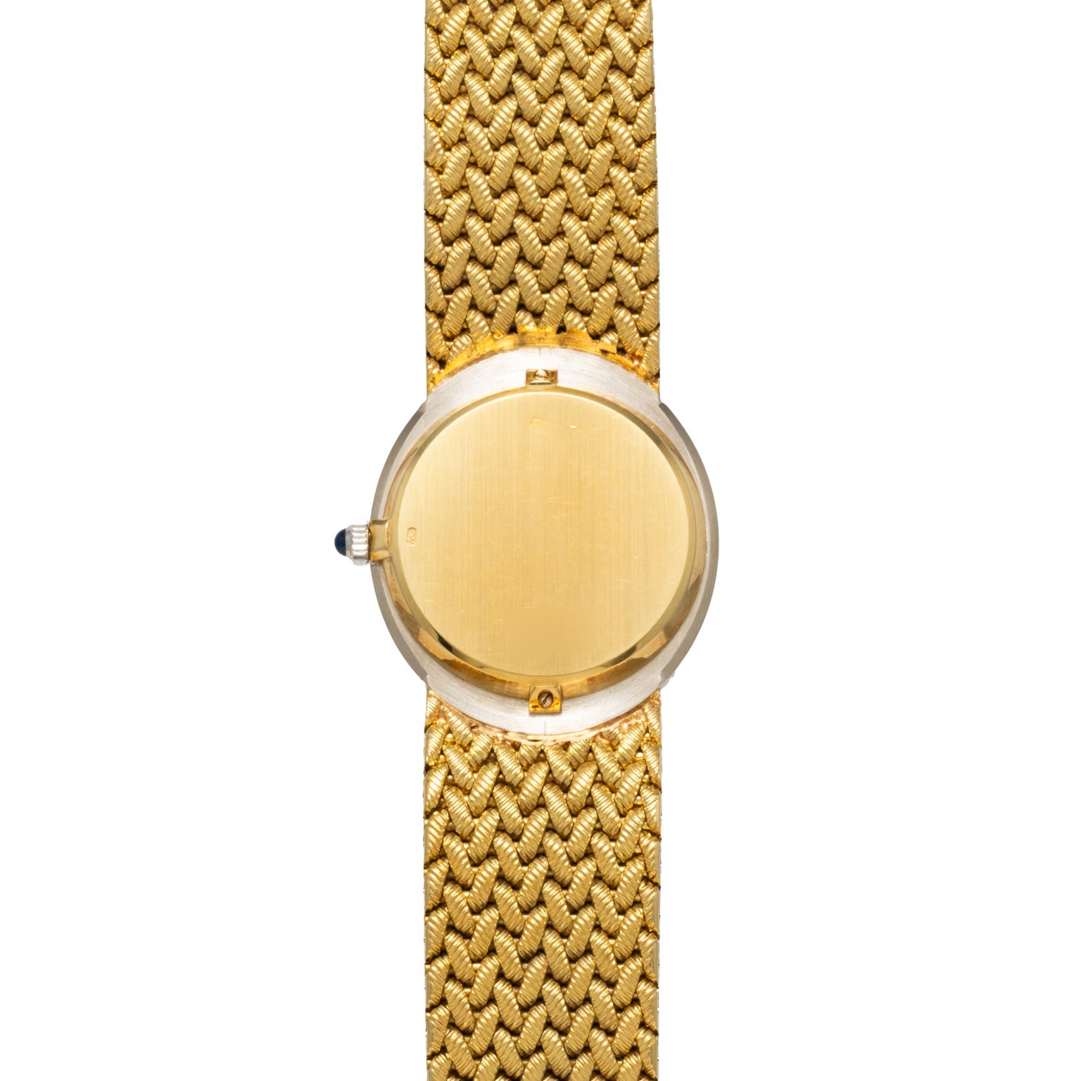 The Piaget Opal Yellow Gold Dress Watch features a woven band and a plain, unmarked round face, shown from above.