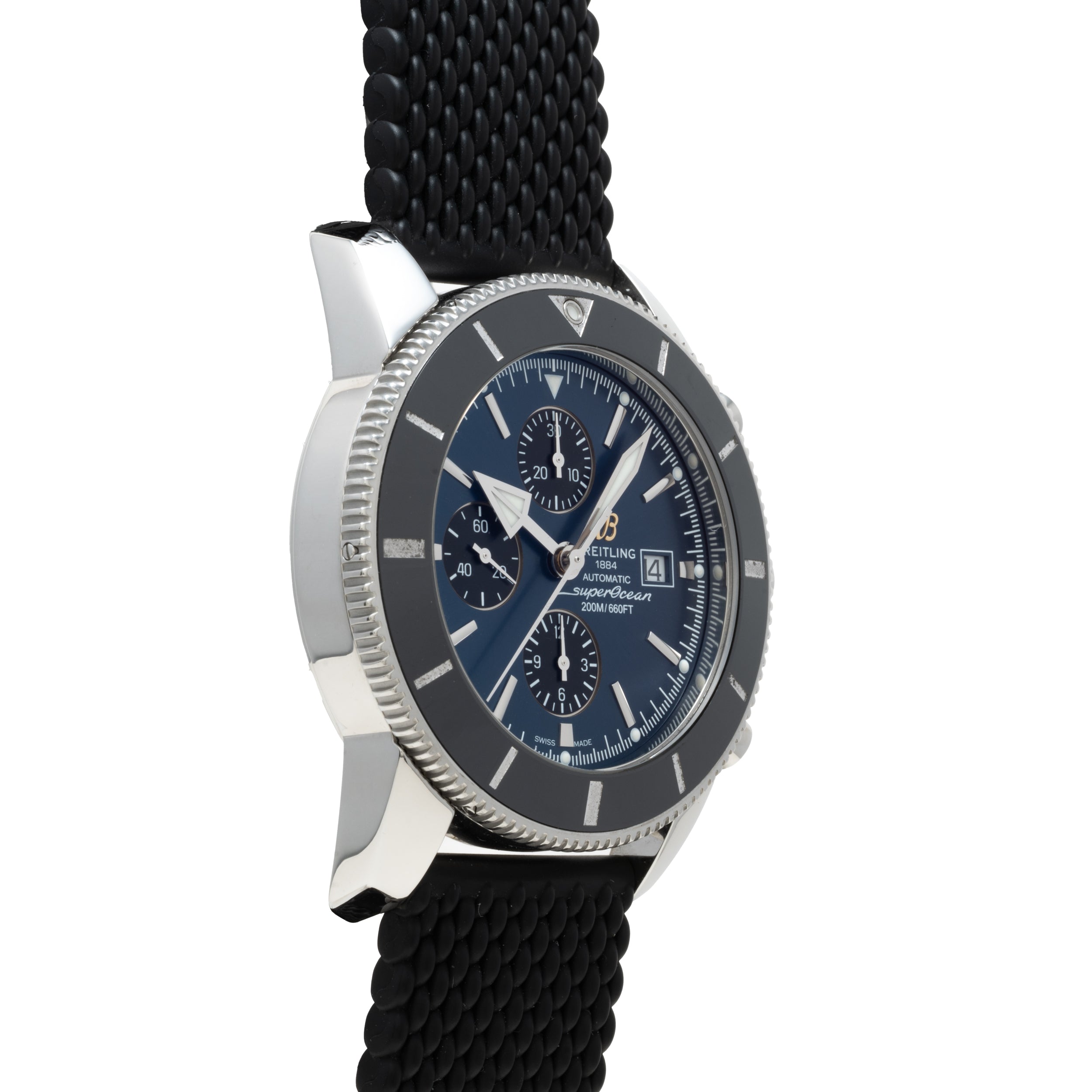 Angled view of the Breitling SuperOcean B01 Chronograph 44 wristwatch featuring a black dial, black strap, and silver case.