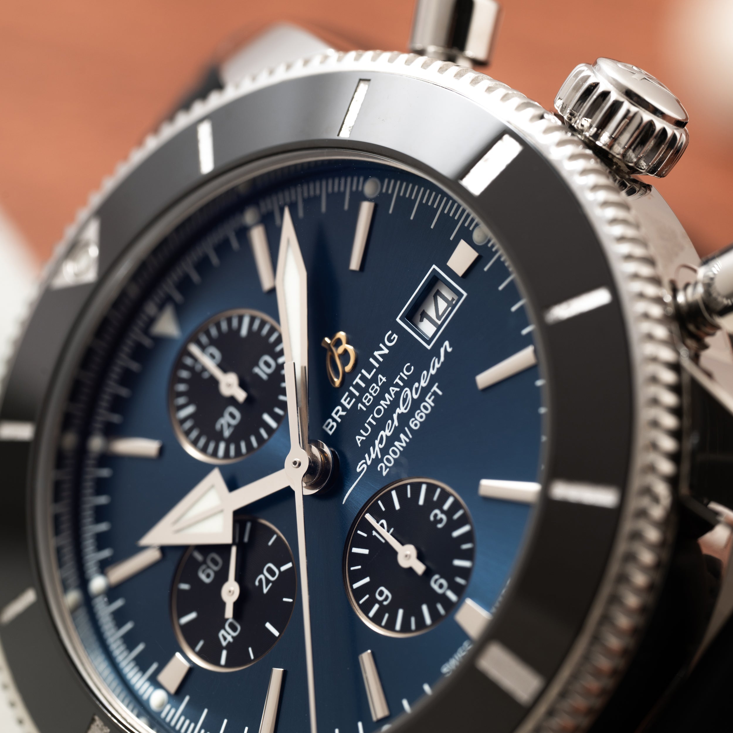 Close-up of a Breitling SuperOcean B01 Chronograph 44 watch featuring a blue dial and silver bezel.