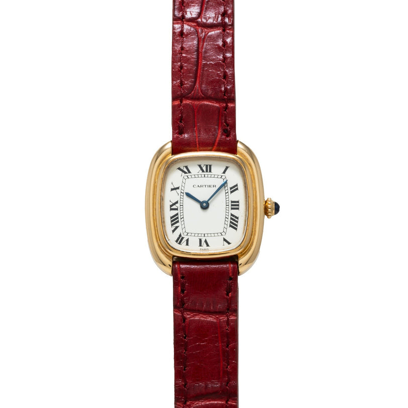 Cartier Gondole Ladies watch featuring a white Roman numeral dial and a textured red leather strap, displayed on a white background.