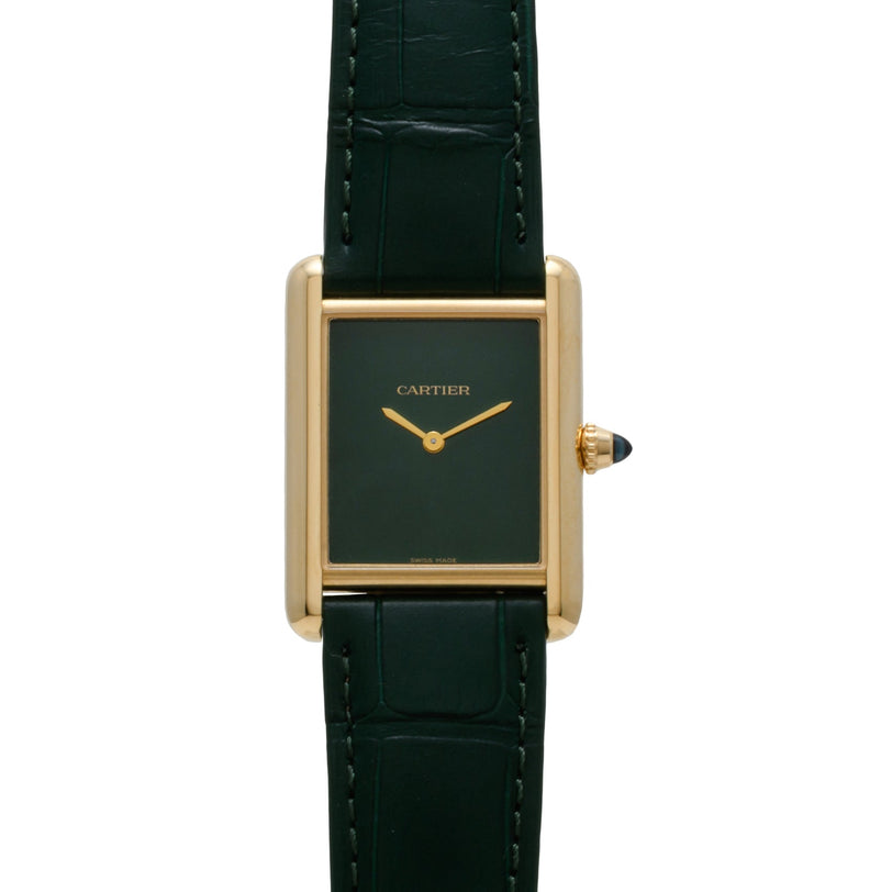 The Cartier Tank Louis watch features a gold case, a dark green rectangular face, and a matching green leather strap.