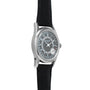 The Patek Philippe Calatrava is a silver wristwatch with a black leather band and a round black dial featuring the date around the edge.