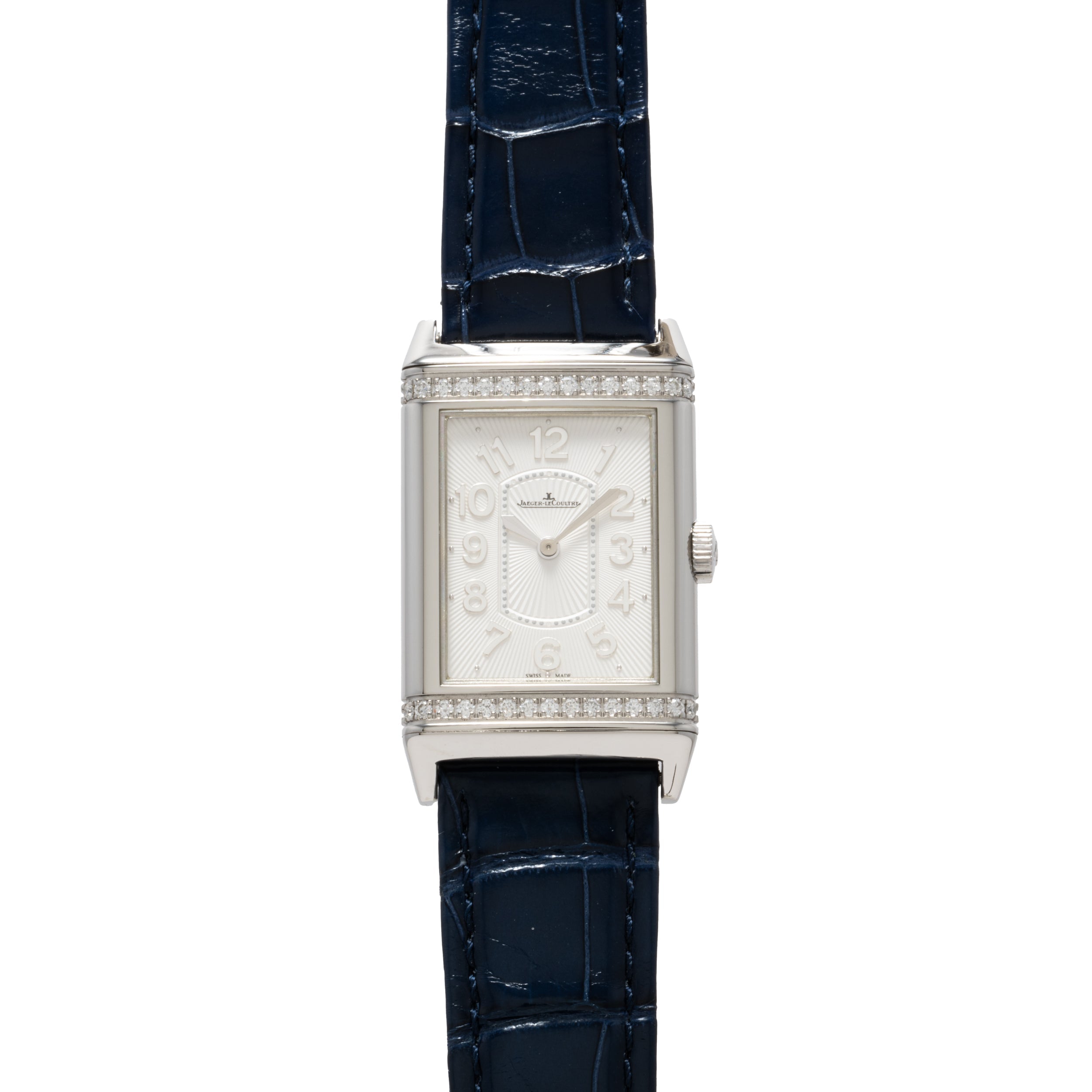 The Jaeger-LeCoultre Reverso Classique Ladies watch features a rectangular silver case, diamond accents, blue leather strap, and displays 12:00 on the dial.