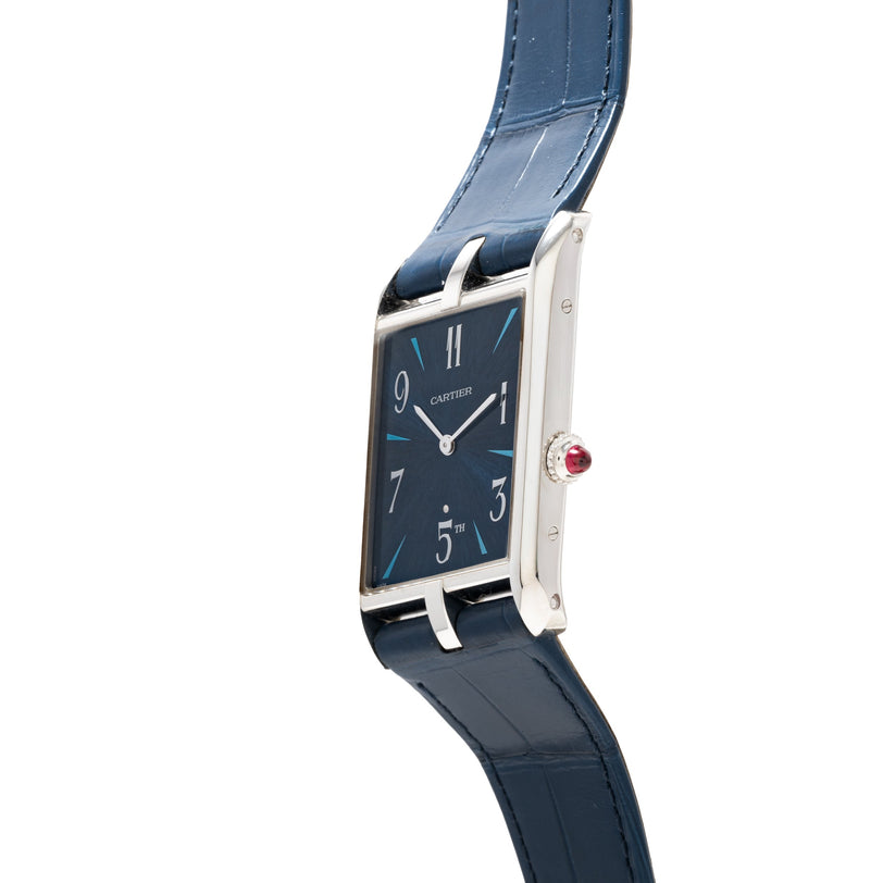 Side view of a blue Cartier Privé Collection Tank Asymétrique New York Edition wristwatch with a square face and blue leather strap.