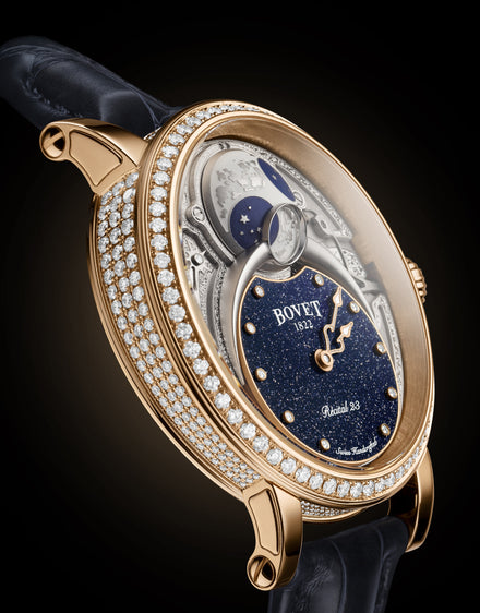 A luxury Bovet wristwatch with a gold case, diamond accents, and a starry night-themed dial.