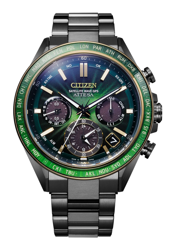 Citizen Attesa titanium chronograph watch with green bezel, blue-green dial, three subdials, and two-tone bracelet.
