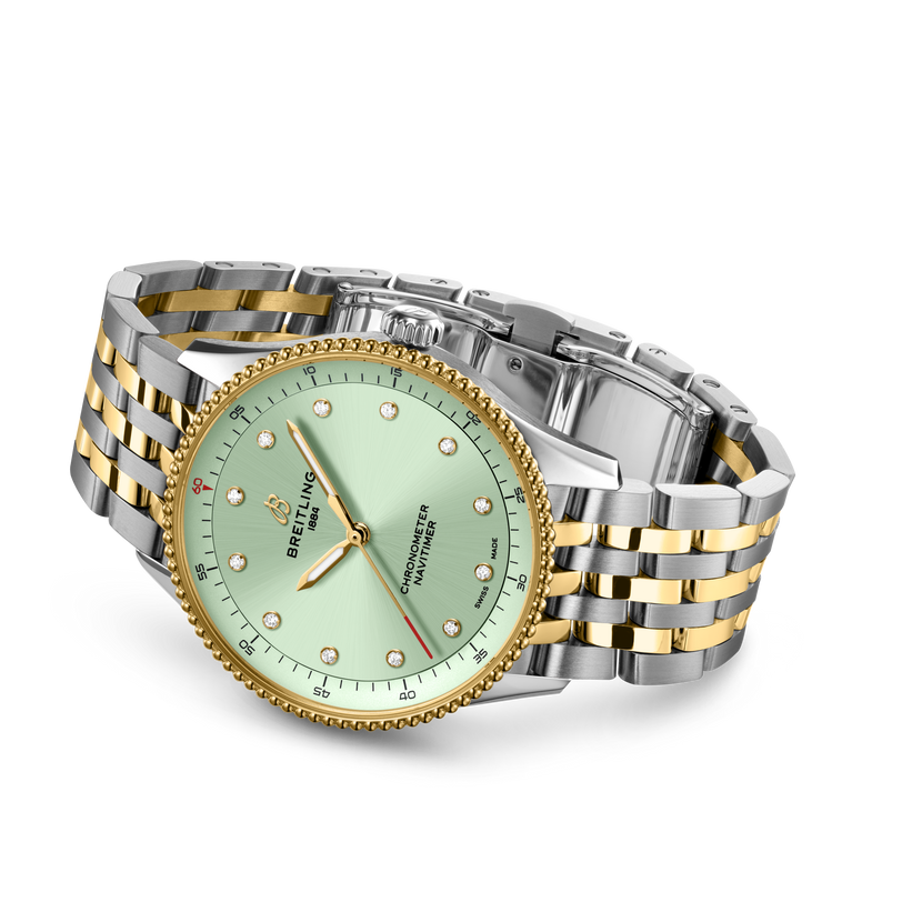Navitimer ladies watch with mint green dial, gold bezel, stainless steel and yellow gold two-tone bracelet, and diamond hour