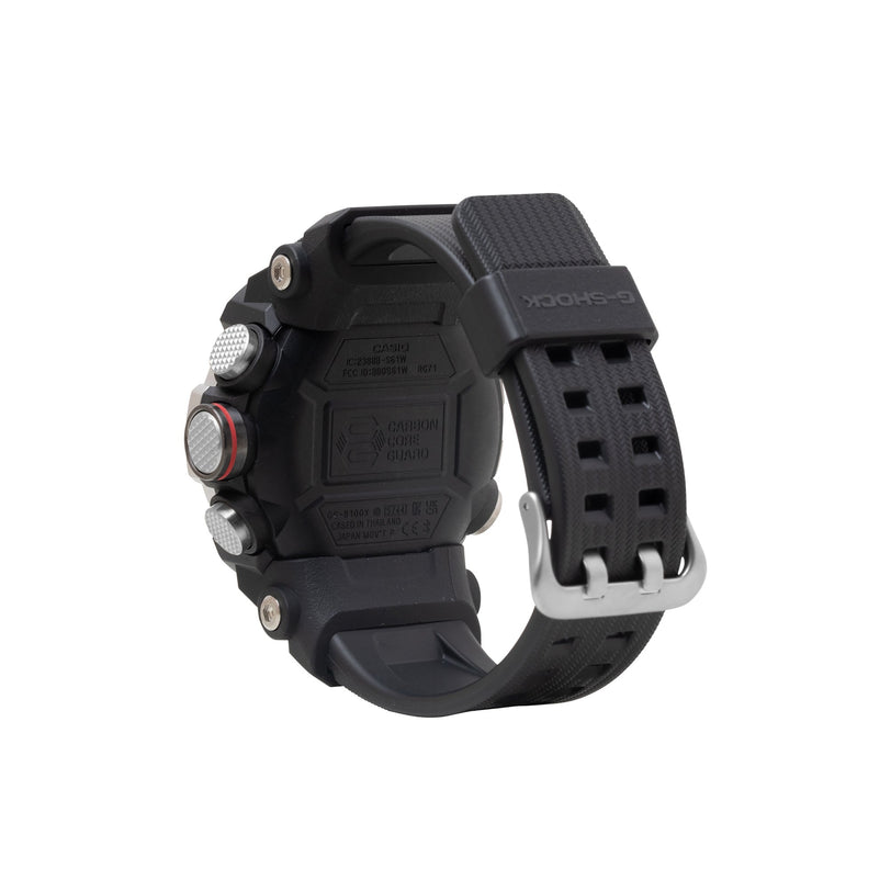 Black digital watch with square face, multiple buttons, textured rubber band, and silver accents on wrist.