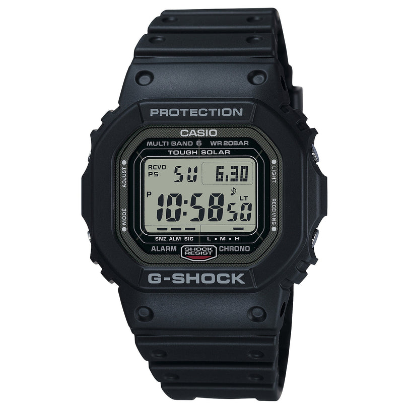 Black Casio G-Shock digital watch with stainless steel and resin case, displaying time and date on LCD screen.