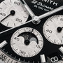 Detailed look at the Zenith Chronomaster Original Triple Calendar Limited Edition for Hodinkee, highlighting subdials, moonphase indicator, and sleek black and silver hour markers—a striking modern triple calendar chronograph by Zenith.
