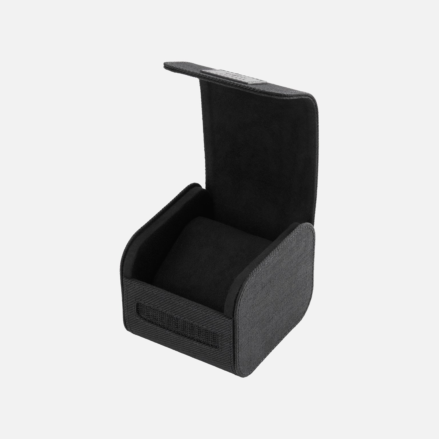 A black, square watch box with a soft interior is open on a white background, displaying its cushioned compartment—perfect for showcasing your Hublot Classic Fusion Titanium Limited Edition For Hodinkee.