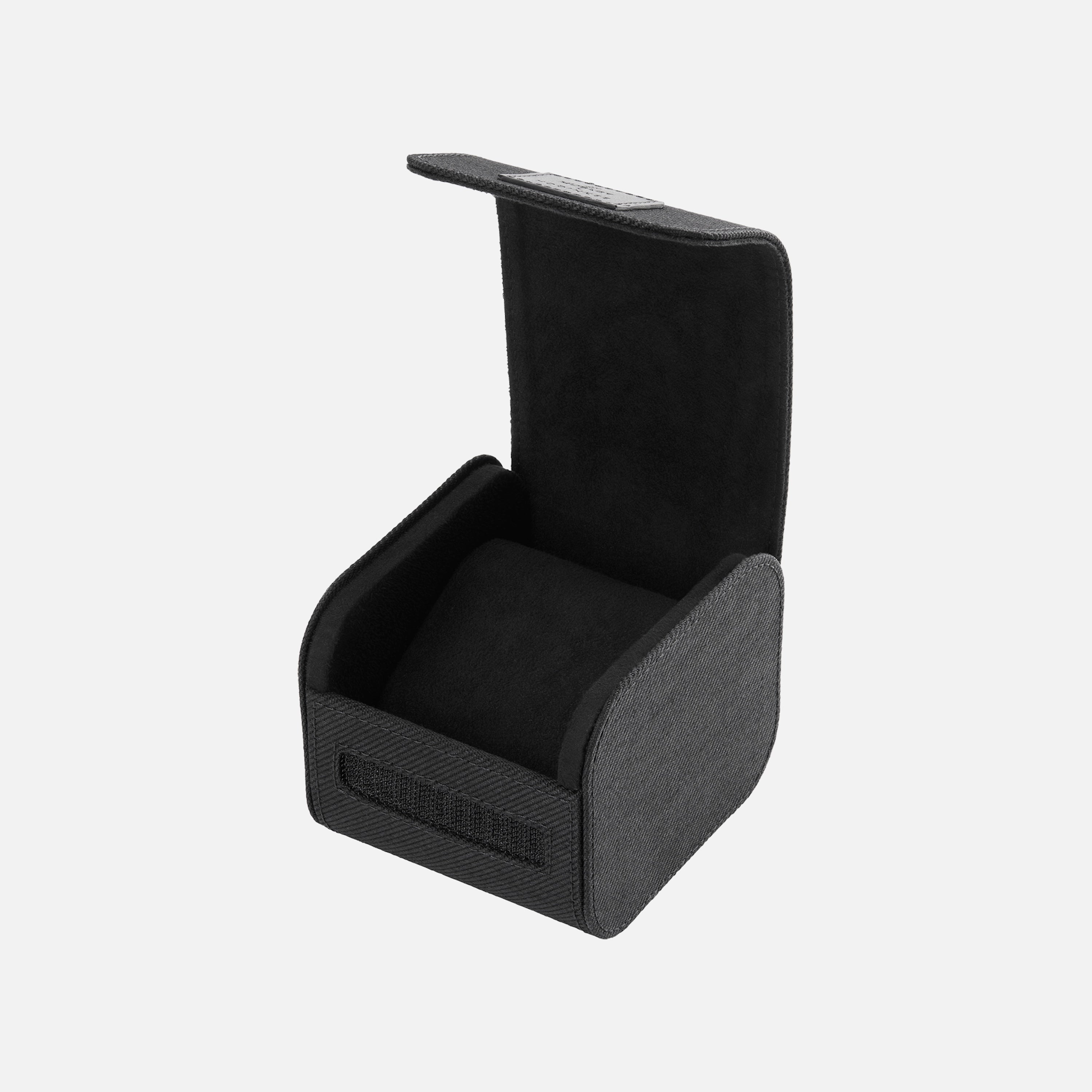 A black, square watch box with a soft interior is open on a white background, displaying its cushioned compartment—perfect for showcasing your Hublot Classic Fusion Titanium Limited Edition For Hodinkee.