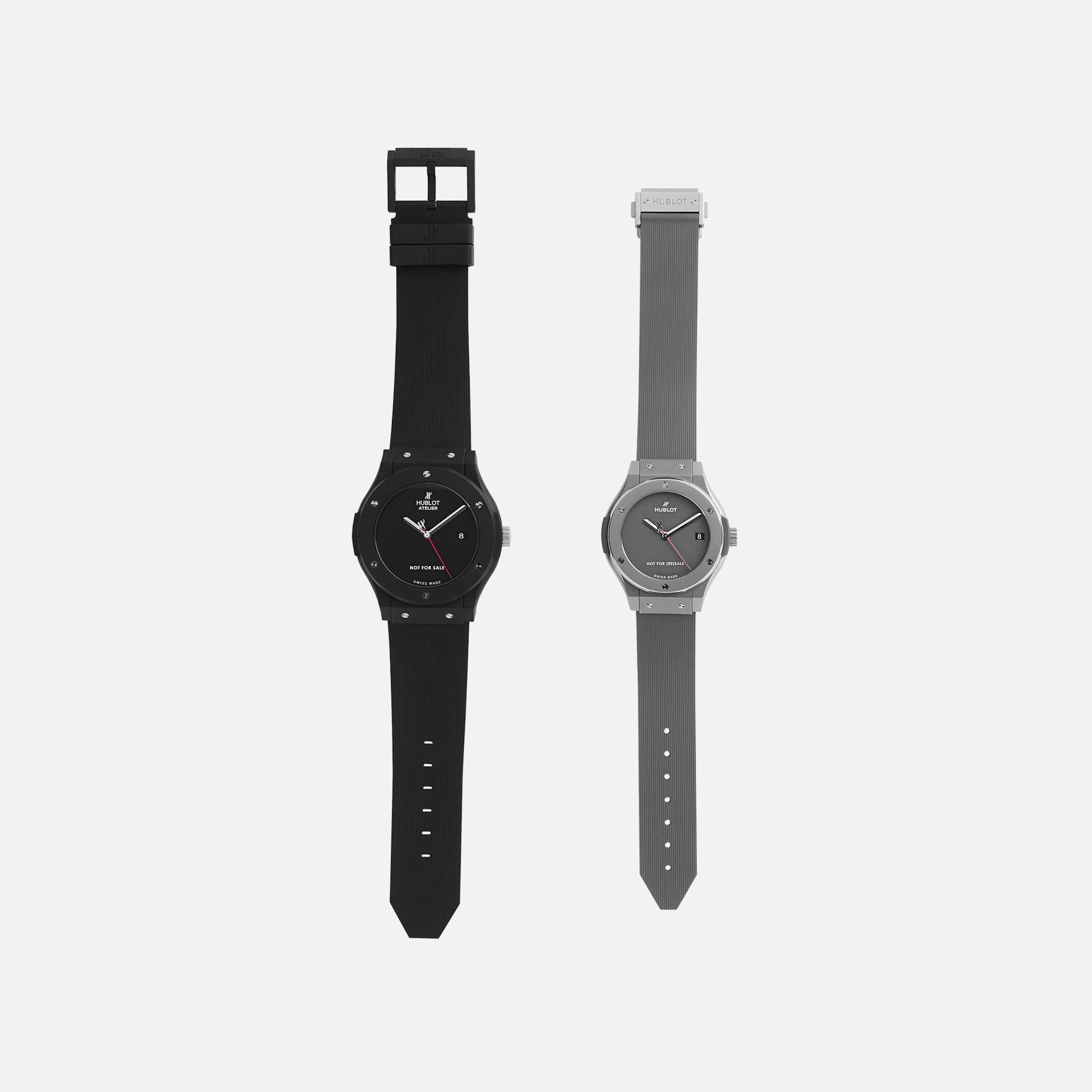 Two Hublot Classic Fusion Titanium Limited Edition For Hodinkee watches are shown side by side on a white background; the left has a black band, while the right features a gray band.